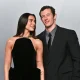 Dua Lipa, left, and Callum Turner had the internet swooning (and more than a little jealous) over their bookworm-y meet-cute.