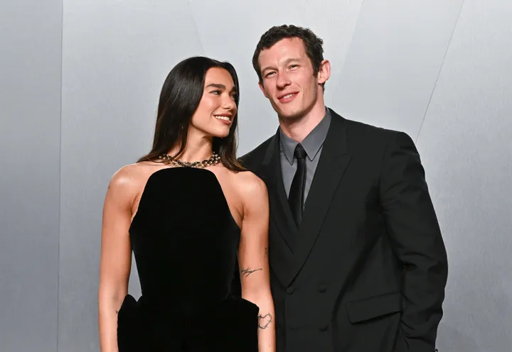 Dua Lipa, left, and Callum Turner had the internet swooning (and more than a little jealous) over their bookworm-y meet-cute.