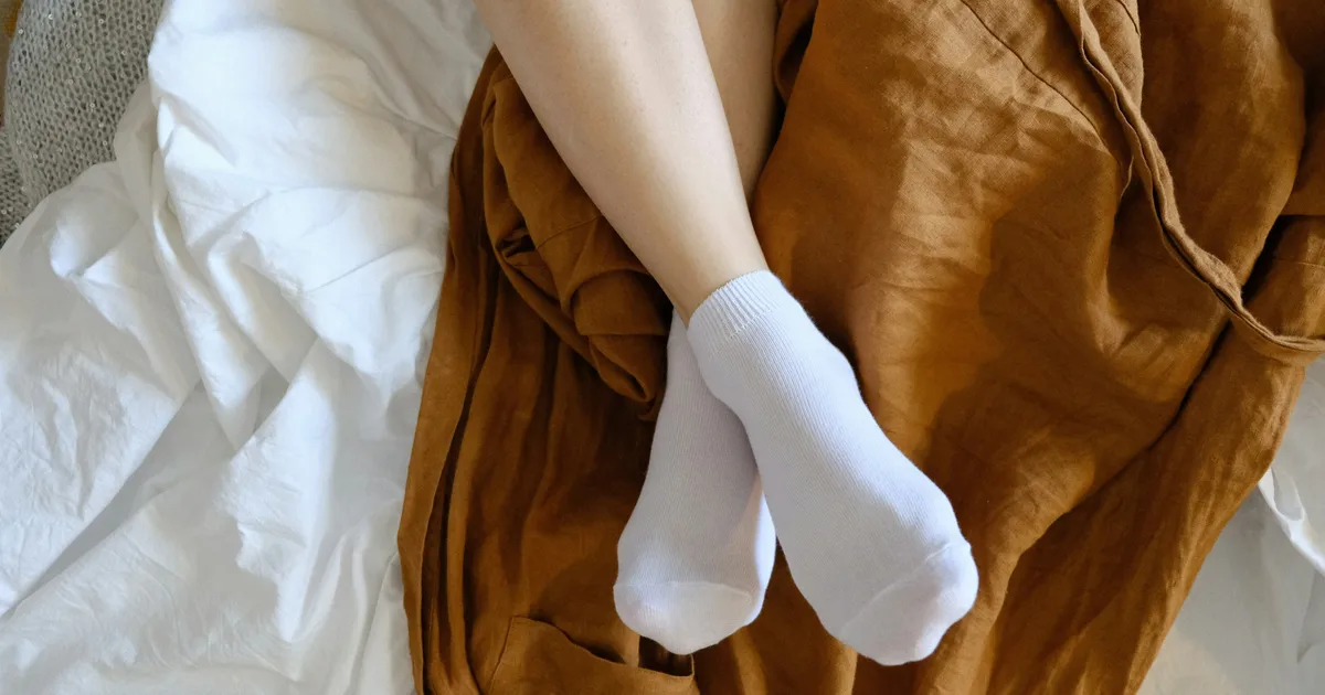 How Can I Sleep In This Heatwave? Refrigerating Your Socks Can Help