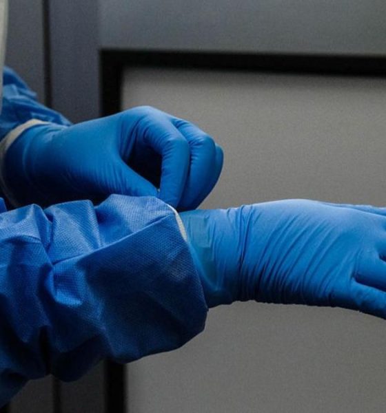 A person wearing blue protective gear
