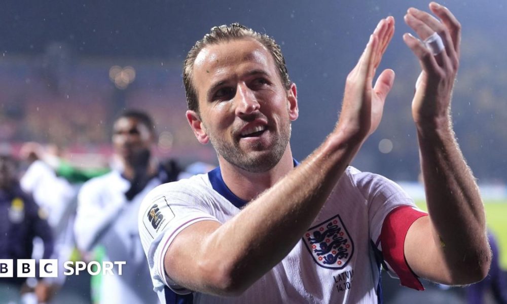 Harry Kane applauding England fans