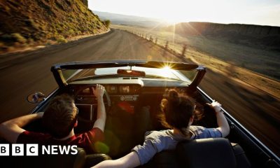 Is the convertible car heading into the sunset?