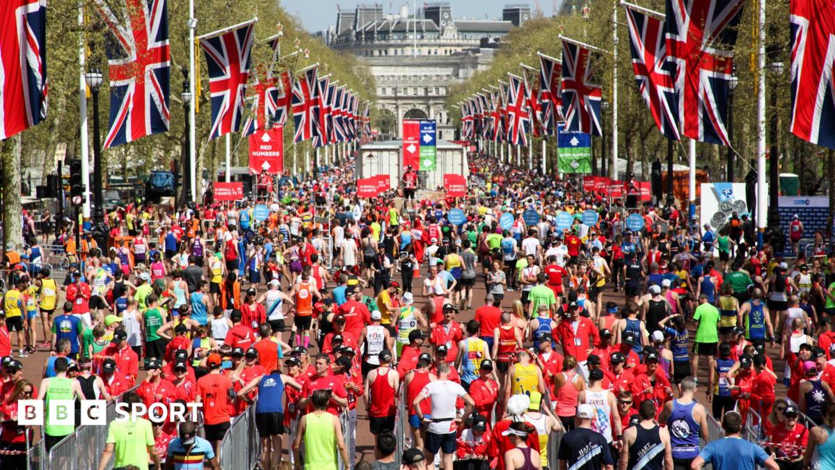 Runners cross the finish line at the London Marathon