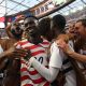 USA players celebrate scoring against Paraguay