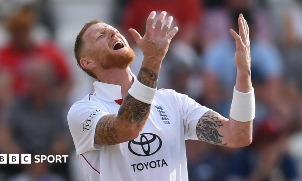 England opener Ben Duckett kisses the badge on his helmet after hitting a century