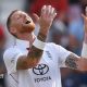 England opener Ben Duckett kisses the badge on his helmet after hitting a century