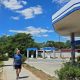A man walks past an empty gas station after local authorities in Crimea suspended petrol sales to the public and businesses due to a fuel crisis caused by Ukrainian attacks on its supply routes,