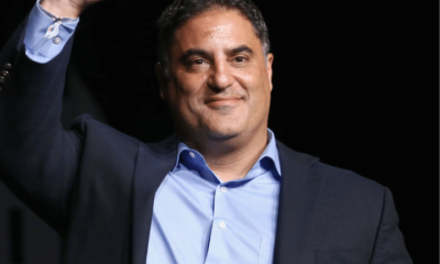 Cenk Uygur waves at a crowd. He was interviewed on LBC with Shelagh Fogarty on 3 June 2026