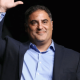 Cenk Uygur waves at a crowd. He was interviewed on LBC with Shelagh Fogarty on 3 June 2026