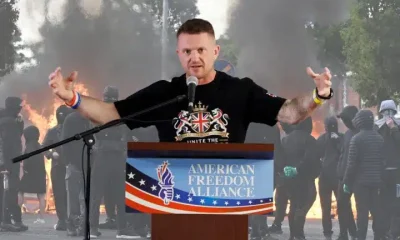 Tommy Robinson in front of Belfast white rioters