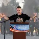 Tommy Robinson in front of Belfast white rioters