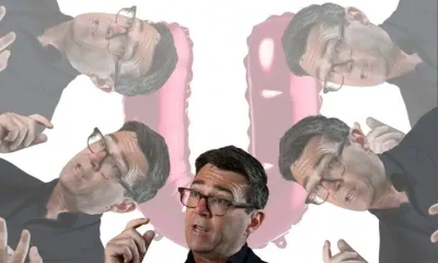 Images of Andy Burnham in front of a big U (Waspi women)