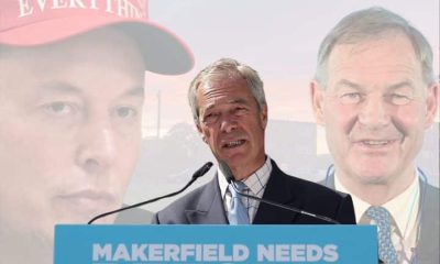 Nigel Farage with Elon Musk and Rupert Lowe behind him