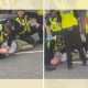 Images of the police violently arresting a man