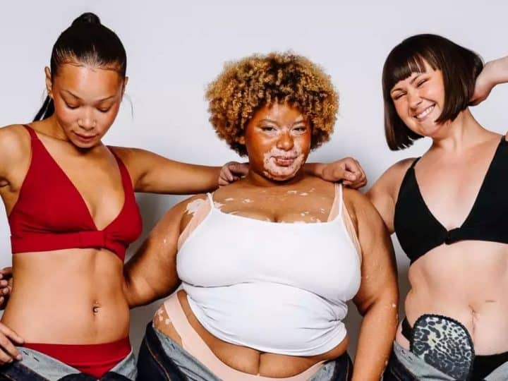 Publicity image for Disability Pride Catwalk Three models wear the Reconditioned Jean