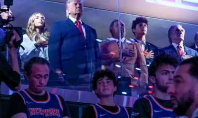 President Donald Trump with his grand daughter Kai Trump (L), Knicks owner James Dolan (3L), US Secretary of the Interior Doug Burgum (3R) and Environmental Protection Agency director Lee Zeldin (2R) attend Game Three of the NBA Finals between the San Antonio Spurs and the New York Knicks at Madison Square Garden in New York on 8 June 2026.