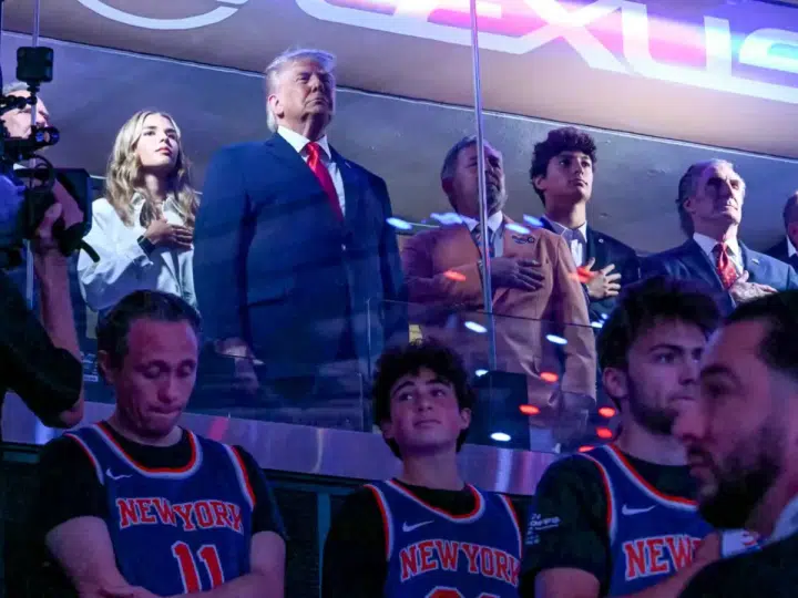 President Donald Trump with his grand daughter Kai Trump (L), Knicks owner James Dolan (3L), US Secretary of the Interior Doug Burgum (3R) and Environmental Protection Agency director Lee Zeldin (2R) attend Game Three of the NBA Finals between the San Antonio Spurs and the New York Knicks at Madison Square Garden in New York on 8 June 2026.