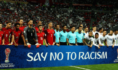 Portugal v Chile: Semi-Final - FIFA Confederations Cup Russia 2017 KAZAN, RUSSIA - JUNE 28: Players and match officials line up with an anti racism banner prior to the FIFA Confederations Cup Russia 2017 Semi-Final between Portugal and Chile at Kazan Arena on June 28, 2017 in Kazan, Russia. (Photo by Ian Walton/Getty Images)