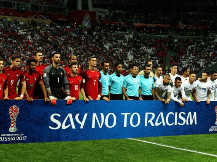 Portugal v Chile: Semi-Final - FIFA Confederations Cup Russia 2017 KAZAN, RUSSIA - JUNE 28: Players and match officials line up with an anti racism banner prior to the FIFA Confederations Cup Russia 2017 Semi-Final between Portugal and Chile at Kazan Arena on June 28, 2017 in Kazan, Russia. (Photo by Ian Walton/Getty Images)