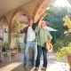 Over 50's couple enjoying holiday in the sun after booking their travel insurance.