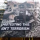 Huge banner shows destruction in Gaza and says: Protesting This Isn't Terrorism Palestine Action