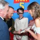Taylor Swift method dresses in designer patchwork dress at Toy Story 5 premiere
