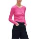 A woman wearing a pink button-front cardigan and black pants