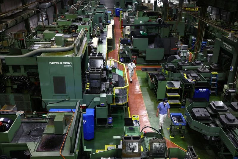Japan’s factory growth slows as cost pressures surge, PMI shows