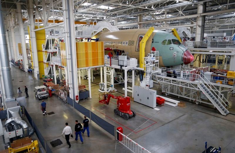 Qantas weighs order for 20 Boeing or Airbus wide-body jets, sources say