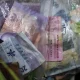 Indonesia central bank, finance minister agree to boost asset yields to aid rupiah