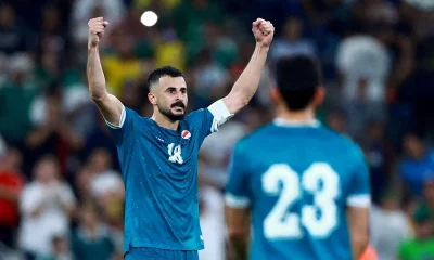 Soccer-Iraq World Cup striker Hussein questioned for hours at Chicago airport, source says
