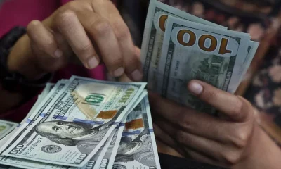 Dollar climbs to two-month peak as Fed hike bets ramp up