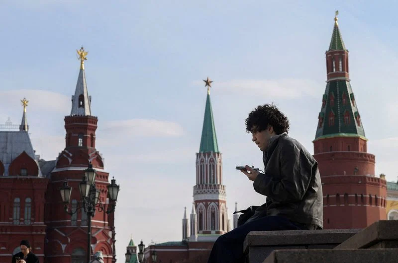 Two phones and an app: How Russians skirt Putin’s digital iron curtain