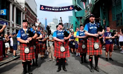 Soccer-Scotland’s Tartan Army switches sports for a day in Boston