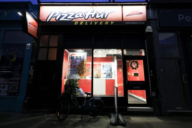 Yum strikes two deals to sell Pizza Hut for $2.7 billion in tale of diverging fortunes