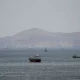 Oil slips again as US, Iran sign peace deal