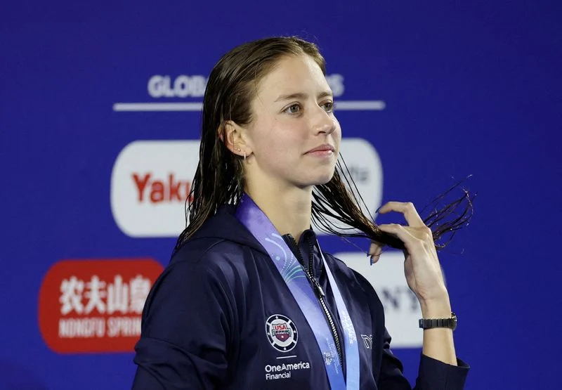 Swimming-American Douglass breaks 50m freestyle world record