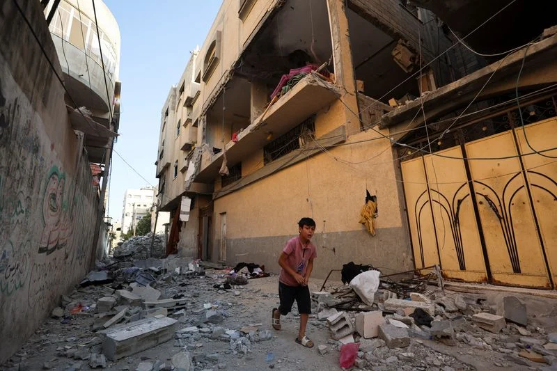 Israeli fire kills five people in Gaza, including a child, medics say