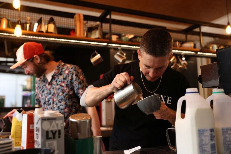Australia employment rebounds in May, jury still out on another rate hike