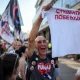 Serbians to keep up protest after President Vucic says he will step down