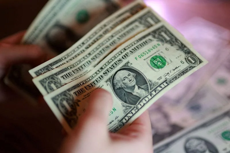 Dollar poised for best month in nearly a year; eyes on jobs data, Gulf tension