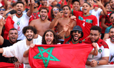 Fans of Team Morocco, some holding flags and others wearing face paint, cheer prior to the Men's semifinal match between Morocco and Spain during the Olympic Games Paris 2024 at Stade de Marseille on August 05, 2024 in Marseille, France.