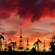 Oil field at sunset, illustrating fossil fuel financing