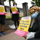 Protesters join a 'Refugees Lives Matter' protest on July 1, 2020 in Glasgow, Scotland. They are holding posters saying: 'Migrants and Refugees welcome here - Blame austerity not migrants'. The crisis in social care will worsen if sponsored workers are further forced to leave