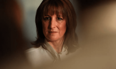 Rachel Reeves looks into the distance looking confident with a shadowy, blurred effect around the edges of the photo