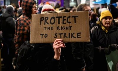 Home made placard saying: Protect The Right To Strike Strike days plummet