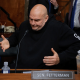 Senate Homeland Security and Governmental Affairs Committee member Senator John Fetterman shrugs after voting for Senator Markwayne Mullin to be Secretary of the Department of Homeland Security at the Dirksen Senate Office Building on Capitol Hill on 19 March 2026 in Washington, DC in the US