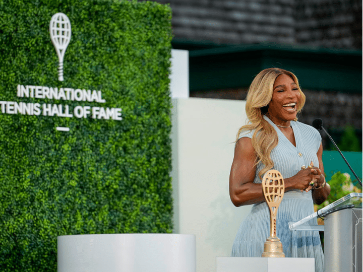 Serena Williams, looking glam in a smart tennis dress, introduces Maria Sharapova during the 2025 Induction Celebration weekend at the International Tennis Hall of Fame in Newport, R.I. on Saturday, August 23, 2025.