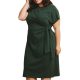 A woman wearing a dark green tie-waist dress with short sleeves