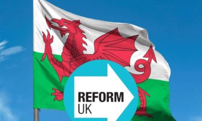 Cymru flag and Reform logo